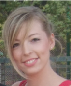 A person smiling for the camera

Description automatically generated